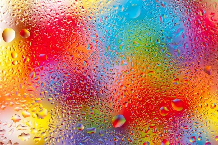 close up water drops glass flowers light rainbow