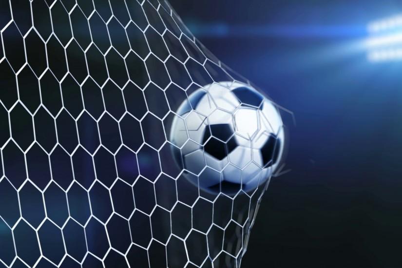 4K slow motion 3d animation of soccer ball flying and tearing goal net on  dark background with stadium lights. Motion Background - VideoBlocks