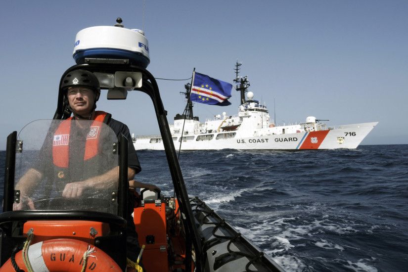 File:US Navy 080609-G-2443T-001 U. S. Coast Guard Chief Boatswain's Mate  James Moerls steers an ...