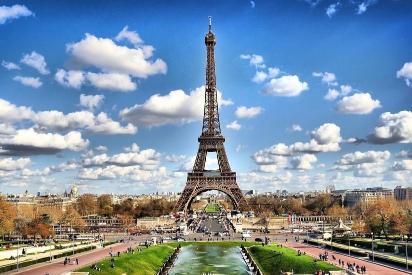 Eiffel tower on background of clouds in Paris, France wallpapers and .