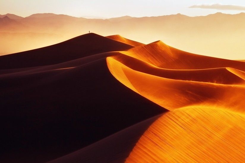 desert morning golden sand sand dune dunes man light