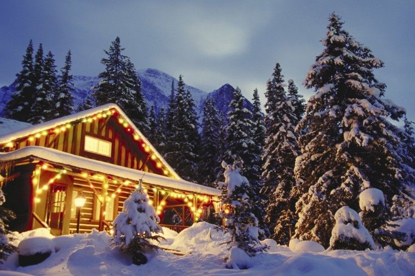 Christmas scene in beautiful snowing mountains