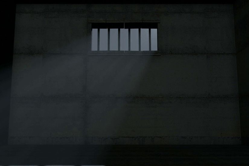 A 24 hour time-lapse from inside an empty dark jail cell with light rays  penetrating the barred window Motion Background - VideoBlocks