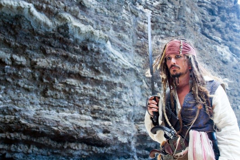 johnny depp actor captain jack sparrow sword rock pirates of the caribbean 4