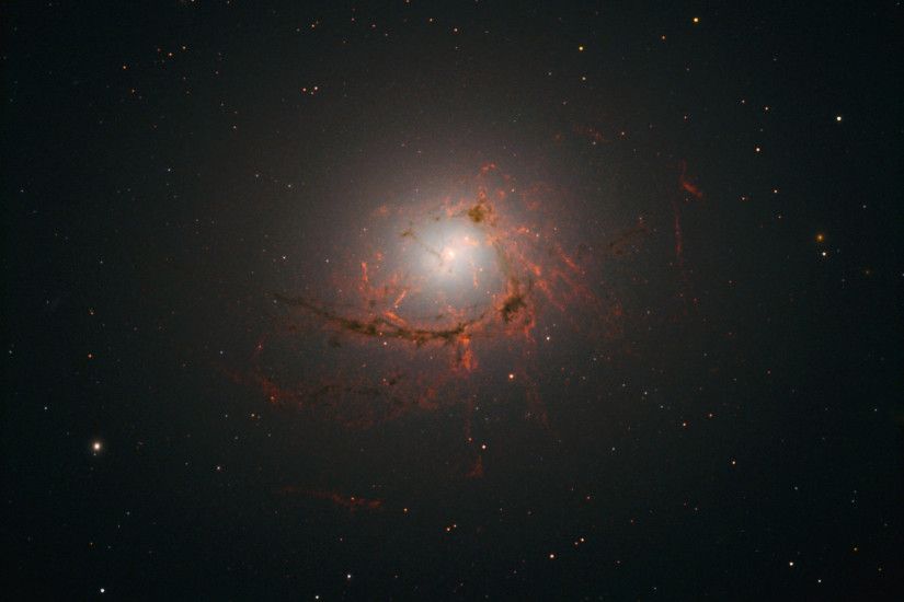 This Hubble image shows the elliptical galaxy NGC 4696. Image credit: NASA  / ESA
