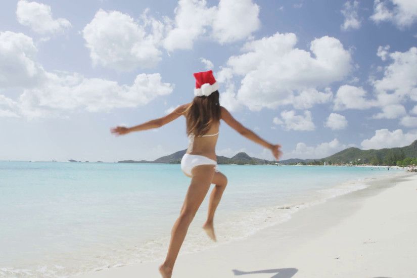 Christmas beach girl in santa hat jumping running on holidays vacation  Stock Video Footage - VideoBlocks