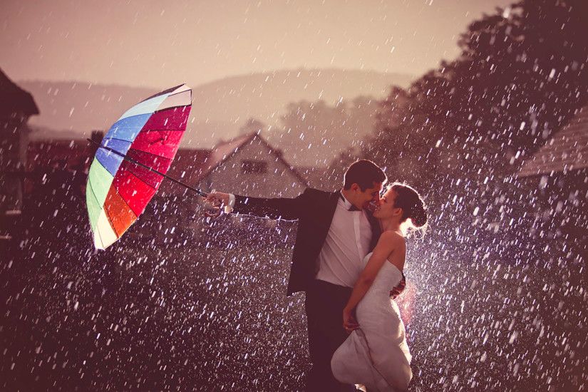 First kiss in rain after getting married
