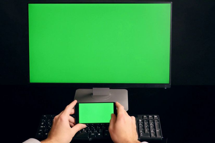 Man using phone with green screen. PC green screen background. Ultra HD, 4K  Stock Video Footage - VideoBlocks