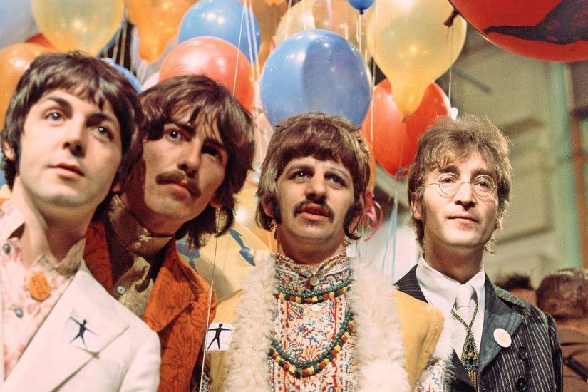 Paul McCartney, from left, George Harrison, Ringo Starr and John Lennon in  June