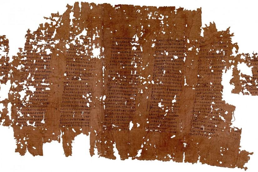 2nd century papyrus of Plato's Phaedrus from Oxyrhynchus, reconstructed  from several fragments. Background from