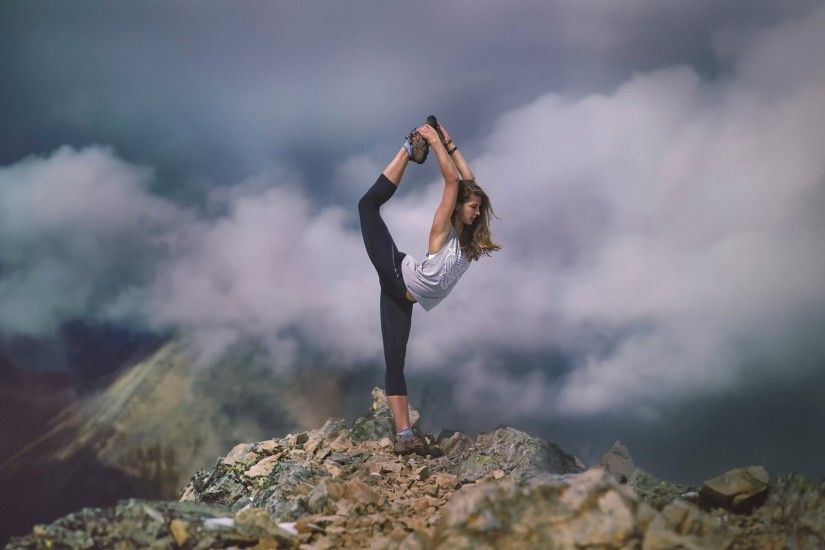 stretch girl athlete stretching clouds mountain