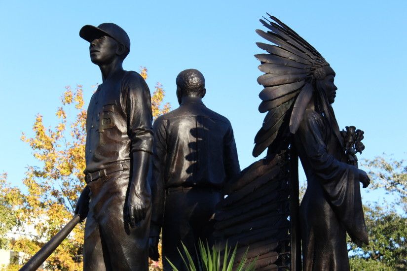 The Integration Statue, sculpted in 2003, celebrates over 50 years of Florida  State being an integrated school for African American and Caucasian  students.
