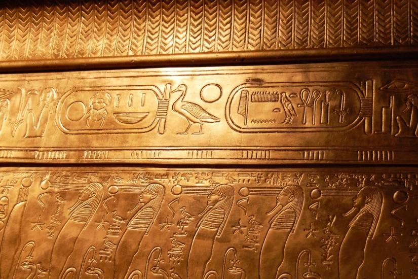 golden Egyptian hieroglyphs wallpaper