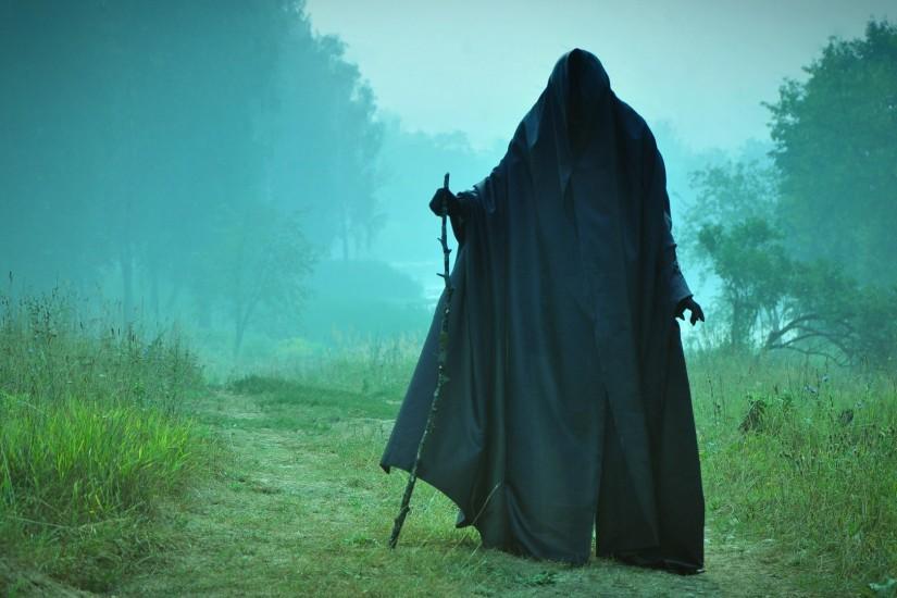 Preview wallpaper man, field, cloak, pilgrim, black, scary 1920x1080