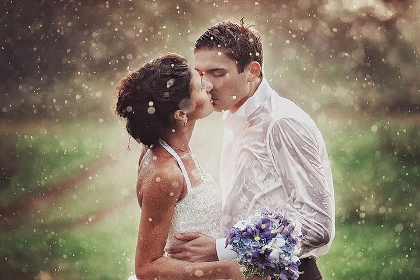 wedding kiss in rain