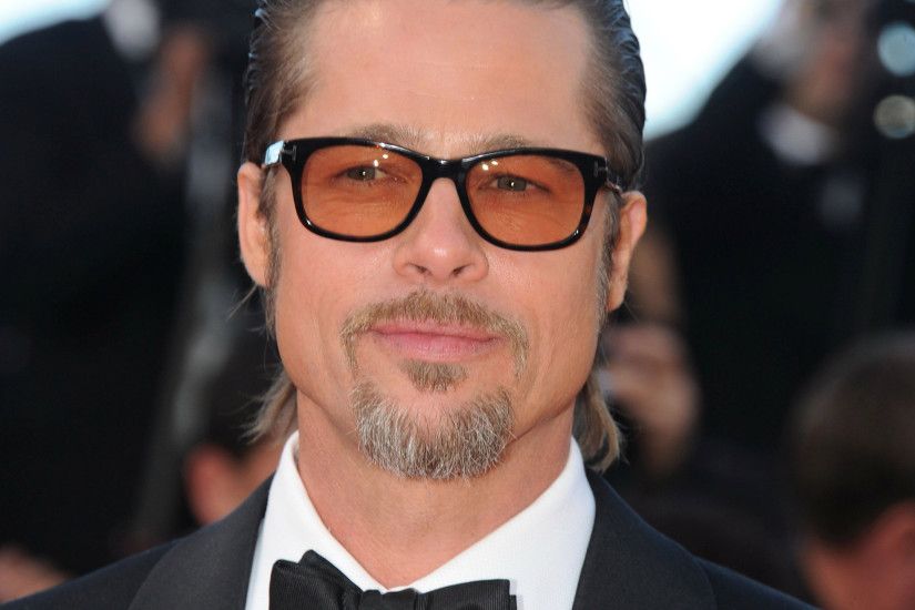 Brad Pitt with glasses and a black bow tie Wallpaper