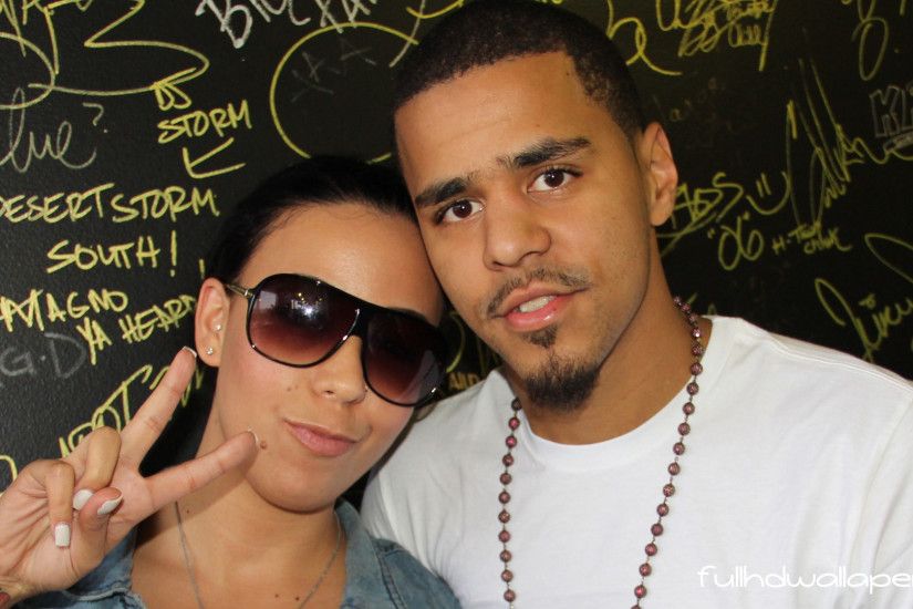 J Cole with his girlfriend