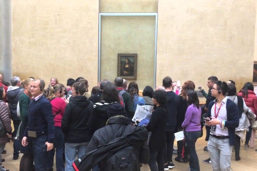 The Mona Lisa artist by Leonardo da Vinci at The Louvre Museum