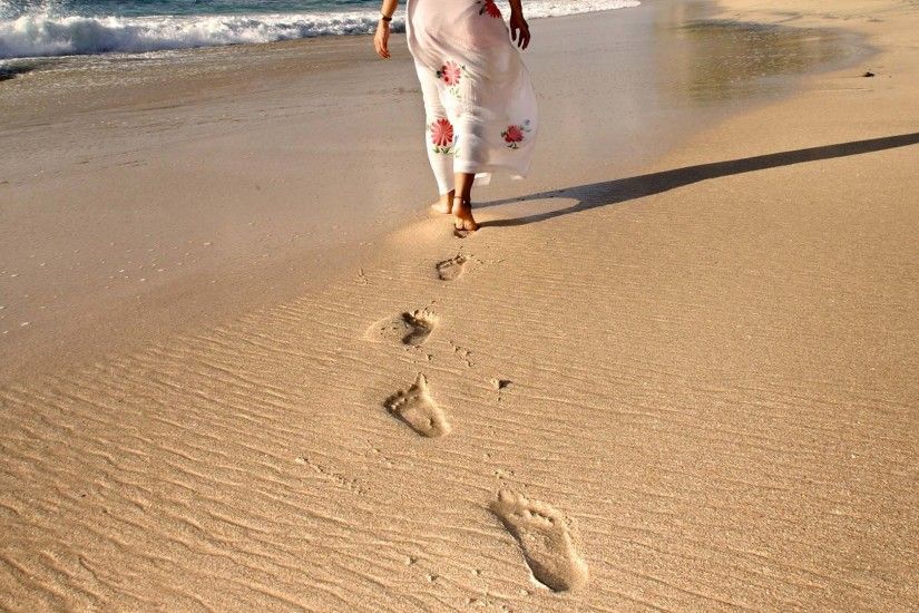 footprints-in-sand-at-beach