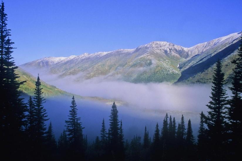 Fog in the northern Rocky Mountains, Muskwa Kechika Wilderness, British  Columbia, Canada