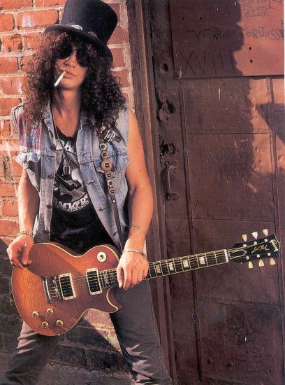 Slash is the first guitar player that really caught my attention as little  kid.