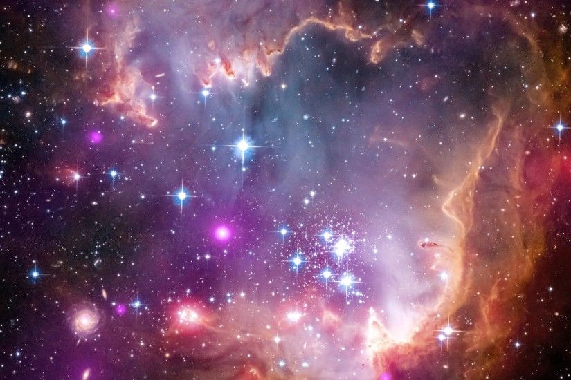 The tip of the 'wing' of the Small Magellanic Cloud galaxy is dazzling in