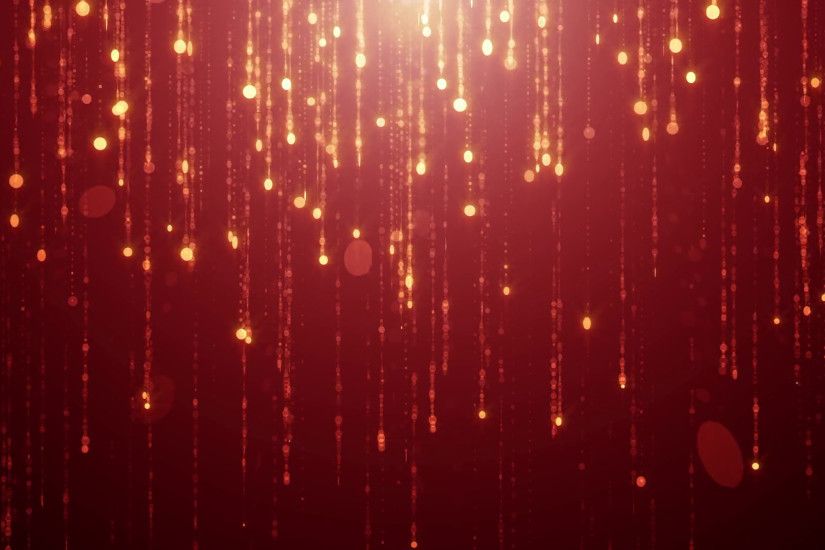 Falling gold particles flicker and shimmer against a black background.  Abstract background for fashion glamour and wealth prosperity Motion  Background - ...