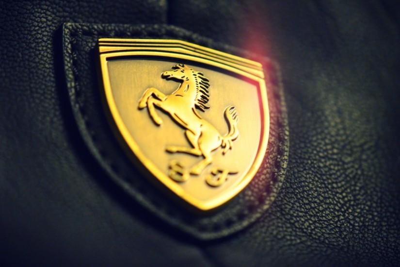 Ferrari logo wallpapesr hd 1080p black and gold.