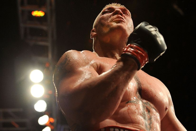 Brock Lesnar reacts after his victory against Shane Carwin to win the UFC  Heavyweight Championship Unification