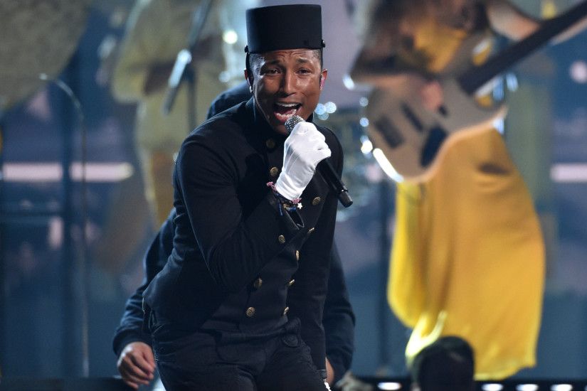 Pharrell Williams performs at the 57th annual Grammy Awards in Los Angeles  on Sunday. |