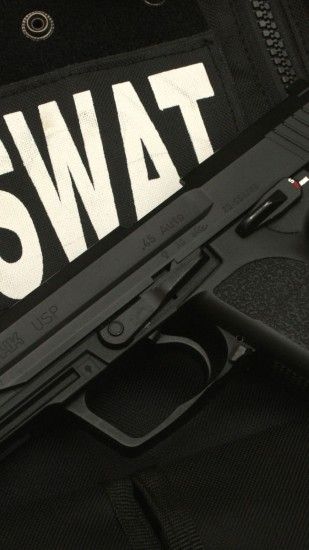 Preview wallpaper swat, pistol, gun, bulletproof vest 1440x2560