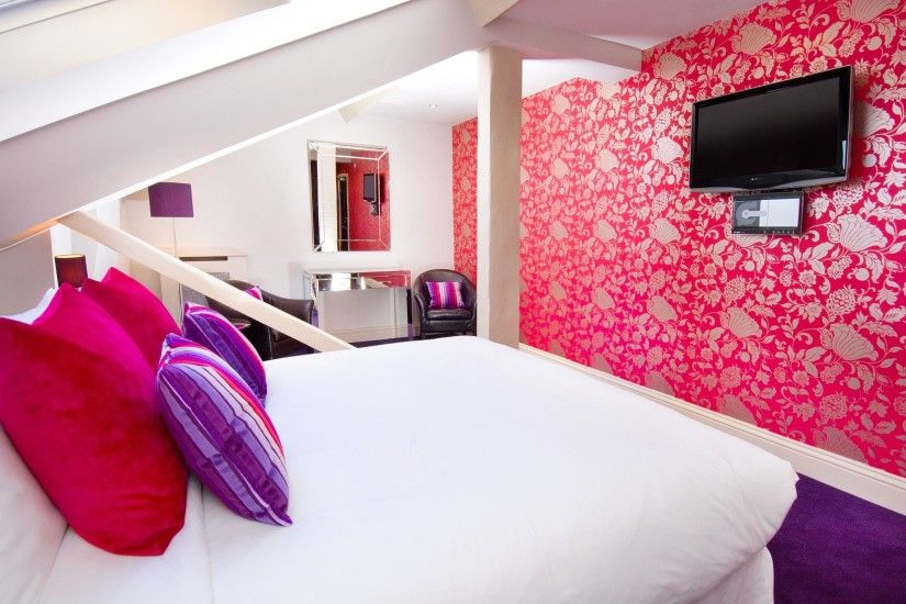 ... Interior Design Of Bedroom In Purple Colour Beige Sofa Beside Shelves  White Mahogany Painted Divan Pink ...