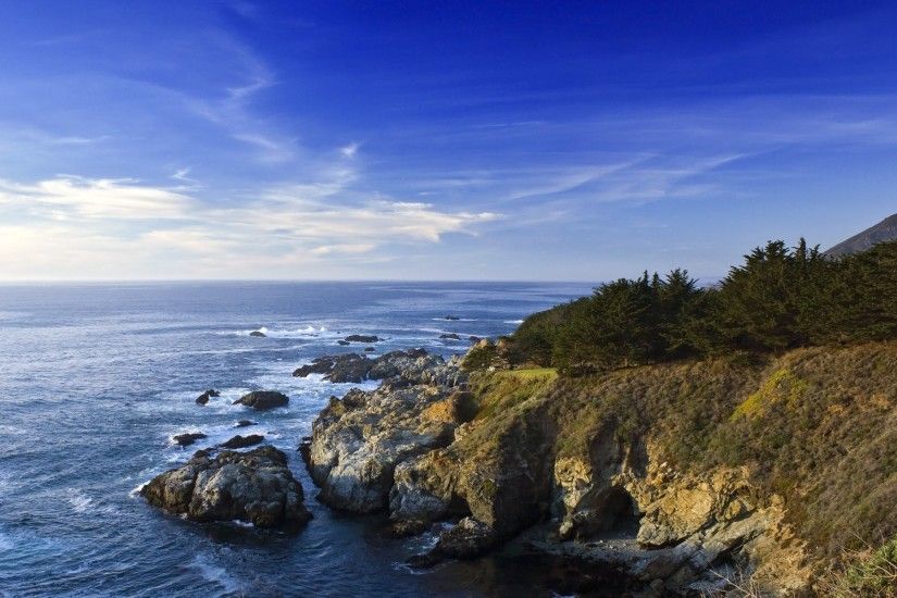 california beach rock sea sky water