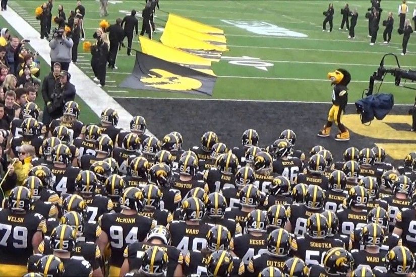 Iowa Hawkeye Football team swarms onto Kinnick Nov. 22, 2014.