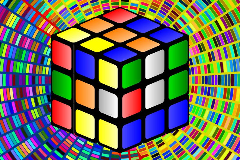 Colorful wallpaper with a rubiks cube.