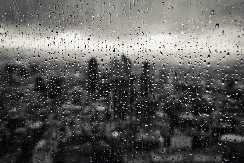 Drops glass rain window city - WallSummit