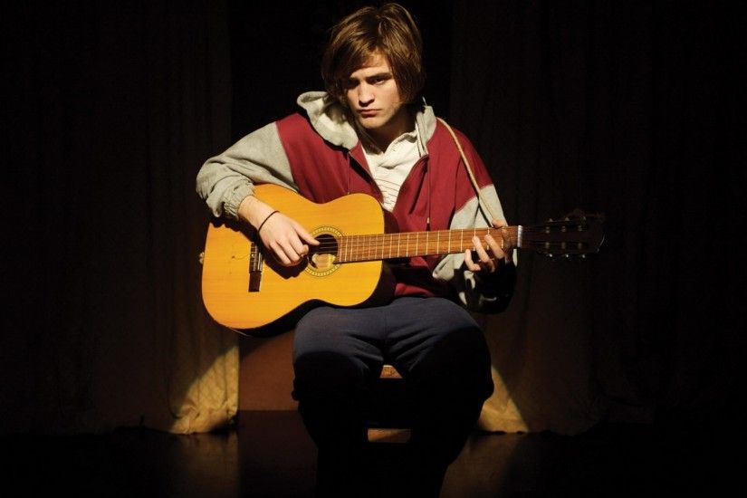 robert pattinson, young man, guitar
