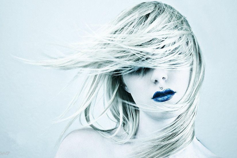 abstract girl in blue with sparkling blue lipstick wallpaper