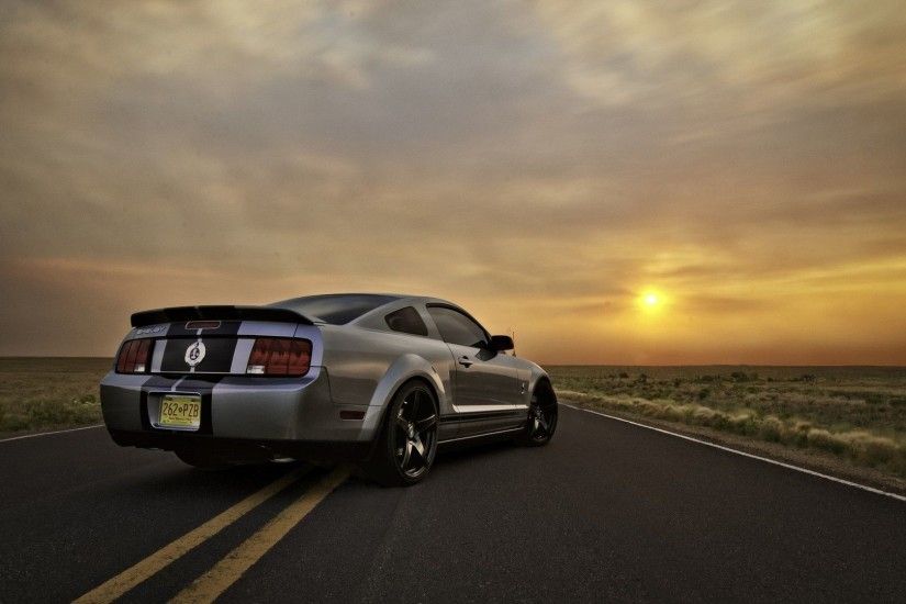 Silver ford mustang sunset
