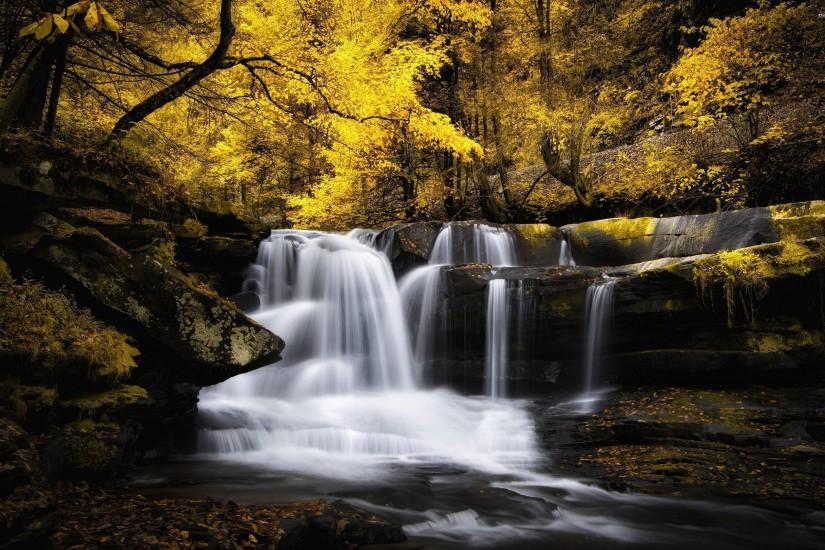 Waterfall in the autumn woods wallpaper