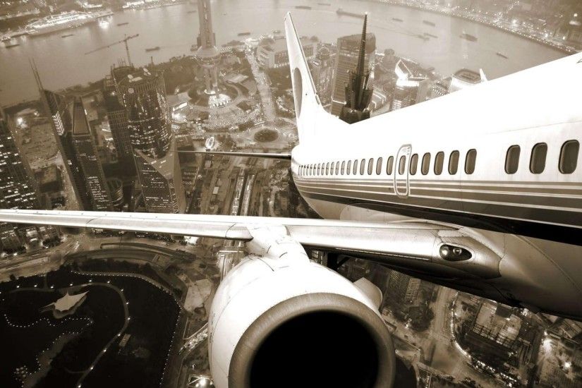 private jet leaving the city wallpaper