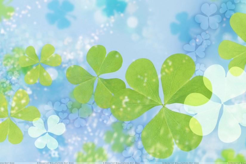 Green Leaves On Cool Blue Background Wallpaper