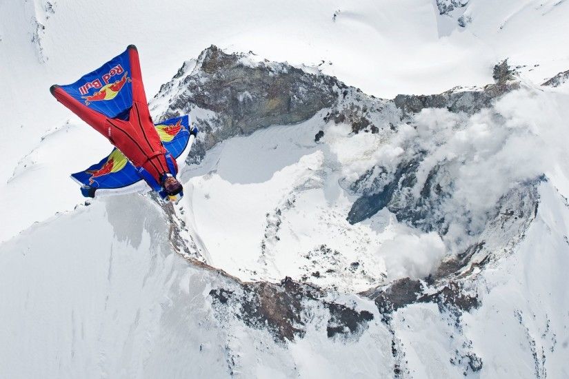 wingsuit pilot fly pilot volcano mountain smoke snow winter trailers  parachute red bull extreme sports