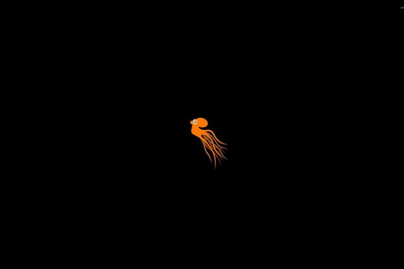 Orange Octopus swimming into the darkness wallpaper 2560x1600 jpg