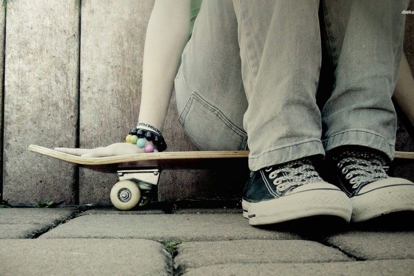 Sitting on a skateboard wallpaper