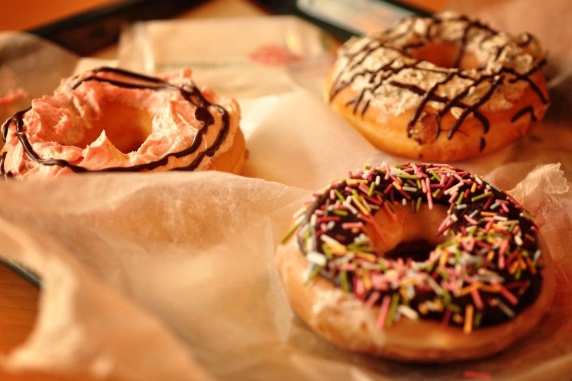 donuts frosting sprinkling rolls