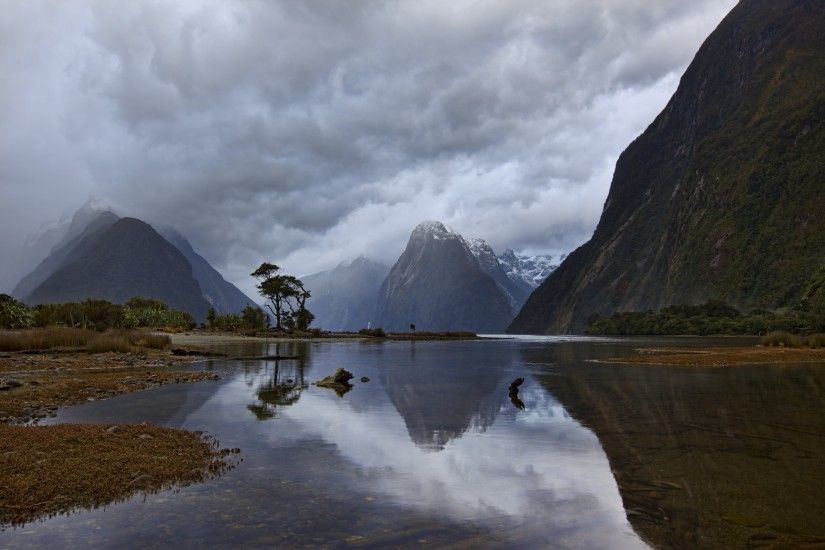 new zealand south island milford sound piopiotahi fjord mountain morning  sky clouds