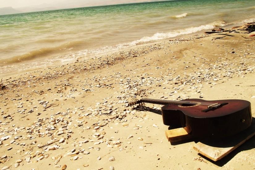 Cool Guitar on Beach hd Background