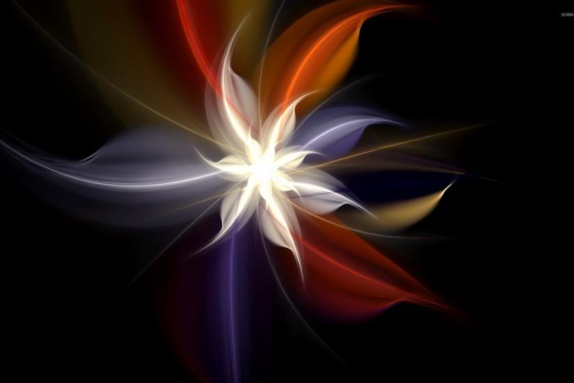 Smoky colorful flower glowing in the darkness wallpaper