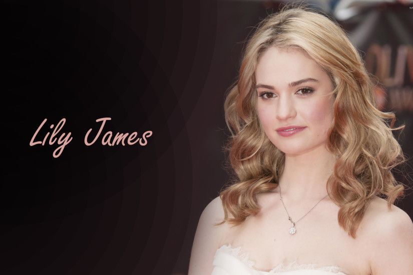 Lily James with loose curls wallpaper